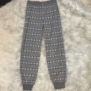 Pj pants with snowflakes on them.